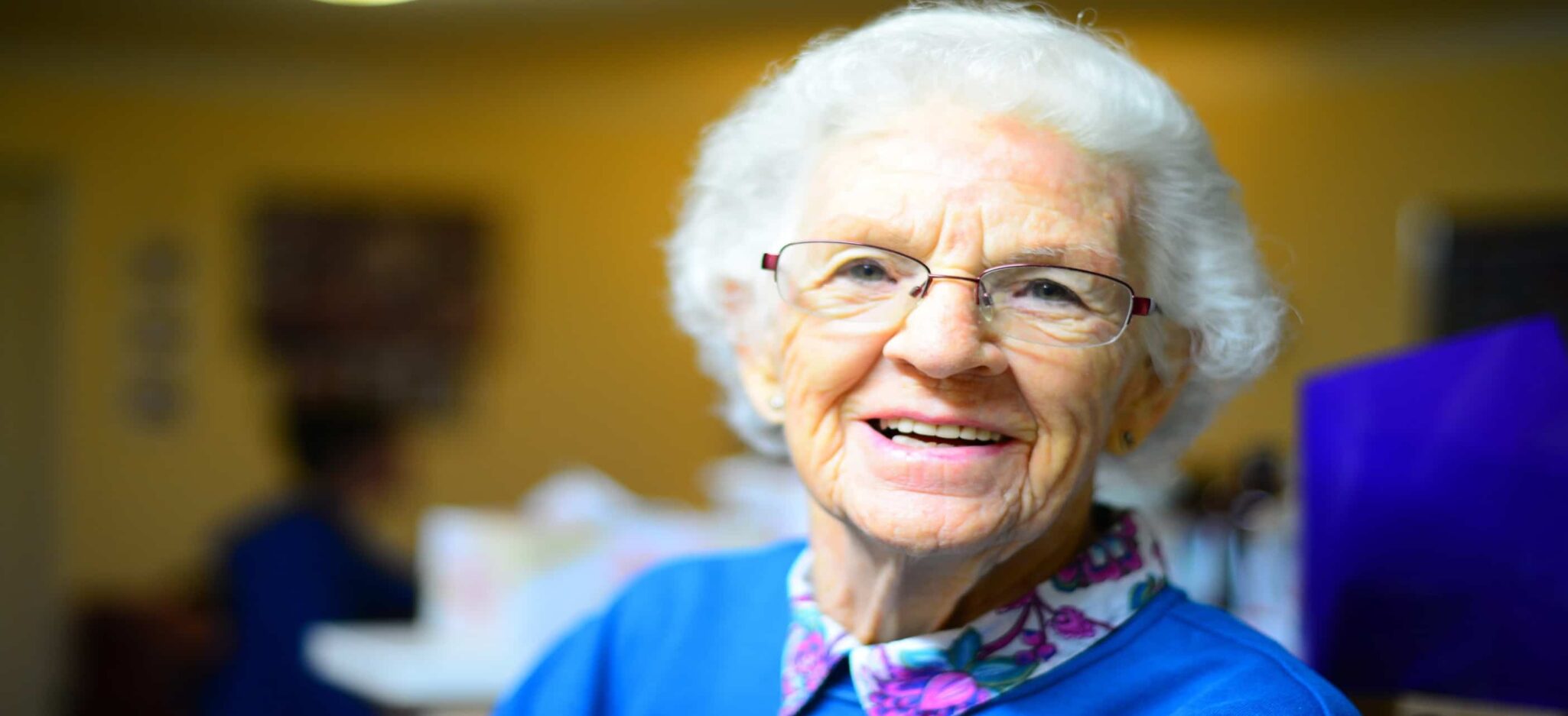 A smiling senior woman.